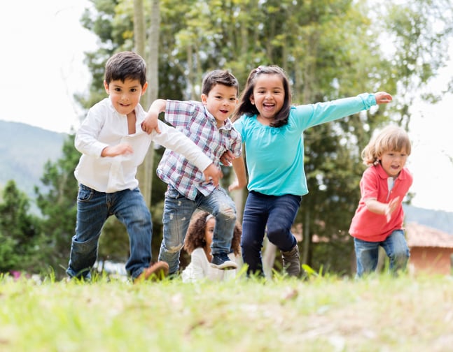 Happy group of kids playing at the park-1